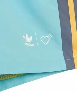 Adidas Human Made Wind Shorts - Light Aqua/St Fade Gold